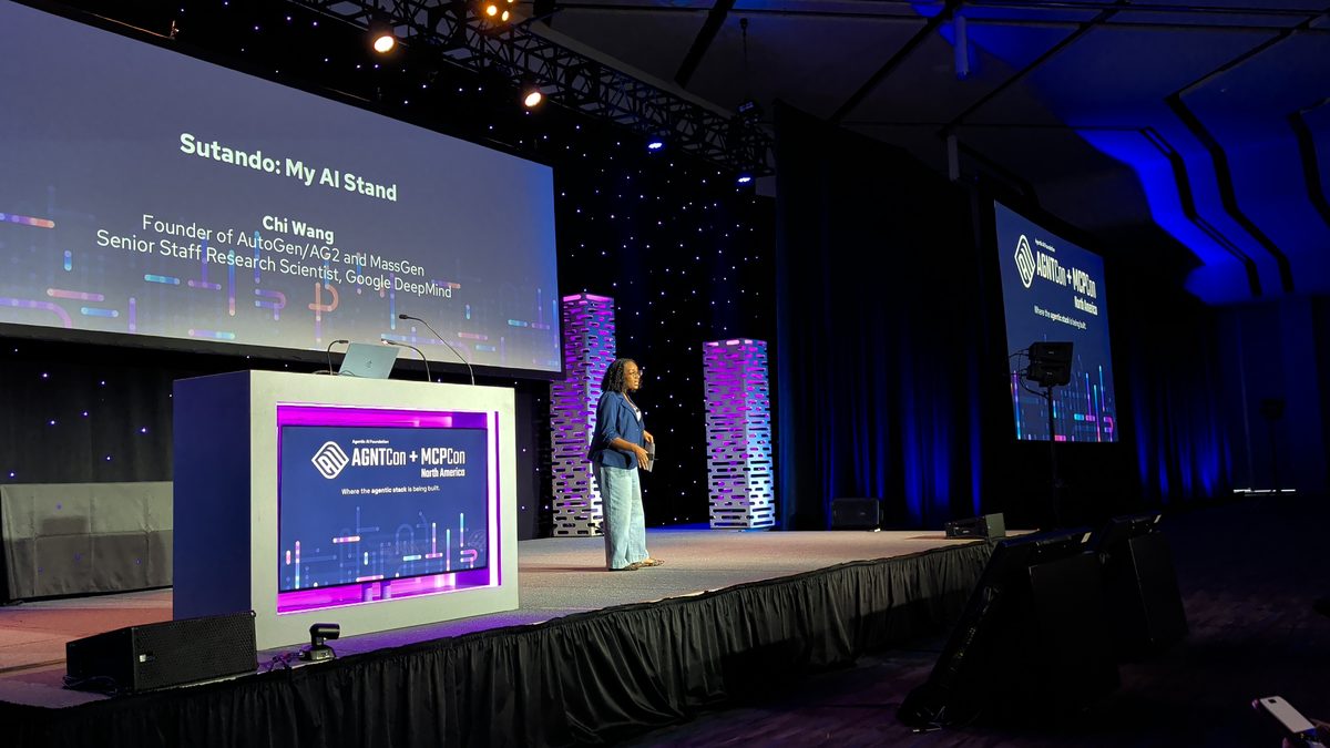 Chi Wang on the keynote stage beside the title slide Sutando: My AI Stand, Founder of AutoGen/AG2 and MassGen, Senior Staff Research Scientist, Google DeepMind