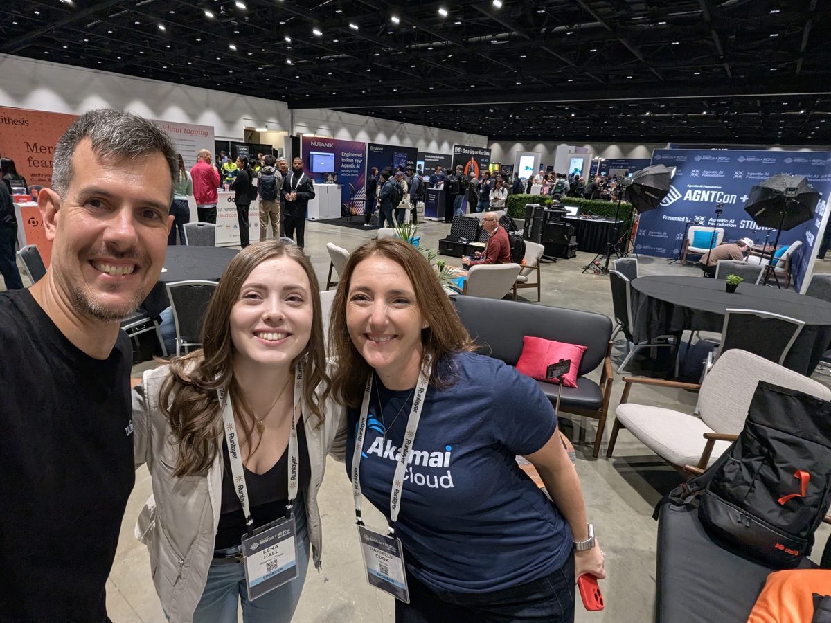 Luca Berton with Lena Hall and Danielle Cook of Akamai in the Solutions Showcase