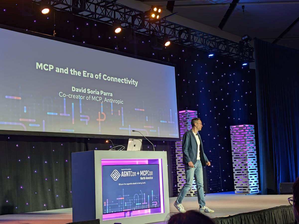 David Soria Parra walking on stage in front of a screen reading MCP and the Era of Connectivity, David Soria Parra, Co-creator of MCP, Anthropic