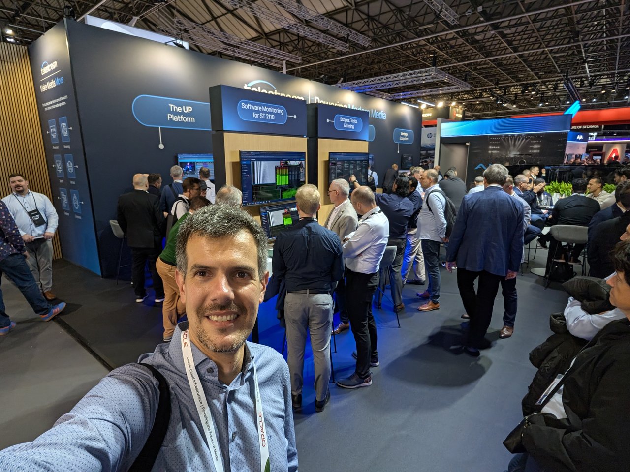 A busy IBC exhibition hall, with the Telestream stand advertising the UP Platform and software monitoring for ST 2110