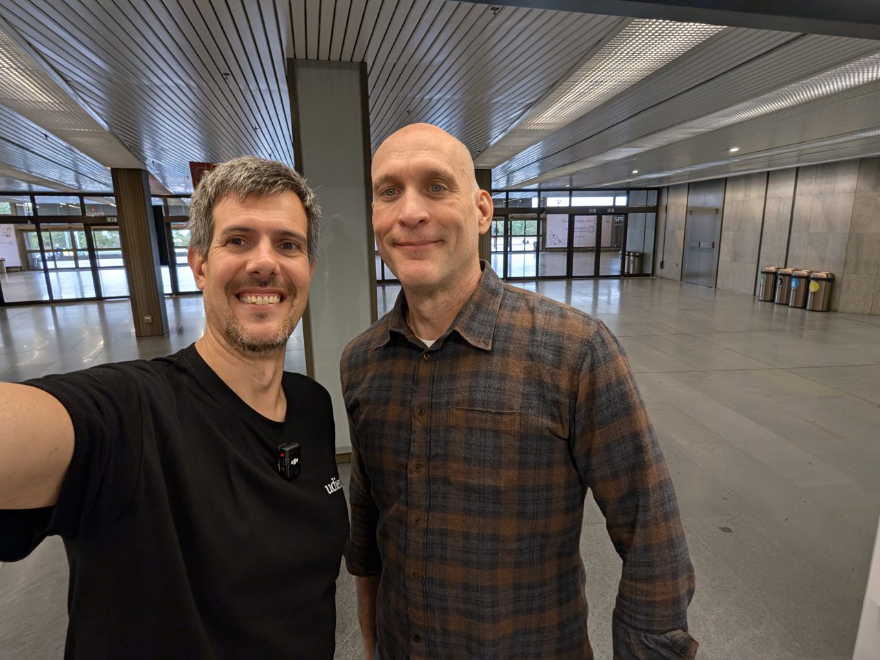 The host with Greg Kroah-Hartman in the registration hall of the Prague Congress Centre