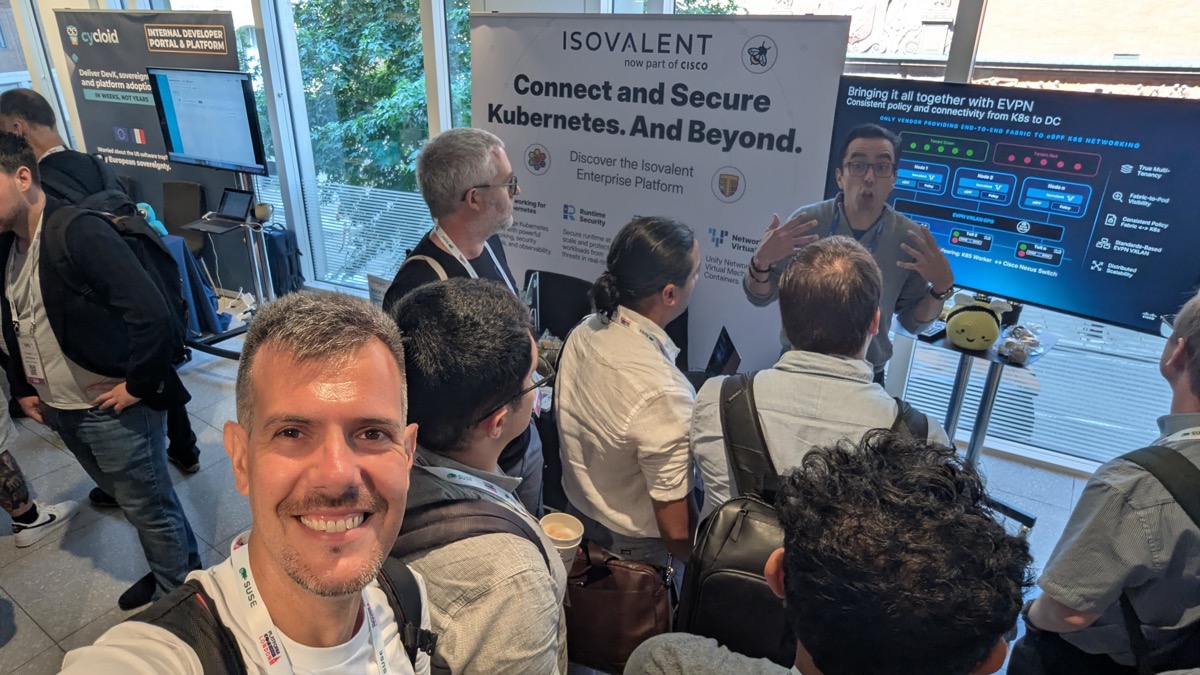 The Isovalent, now part of Cisco, stand at PlatformCon London, with a live EVPN demo on screen showing end-to-end fabric from Kubernetes to the data centre
